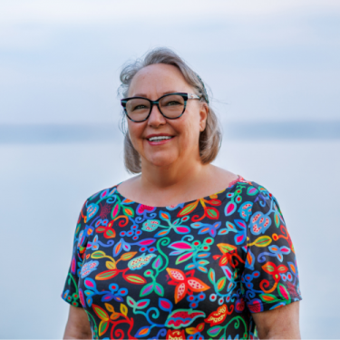 Photo of Siila Watt-Cloutier wearing a colourful shirt