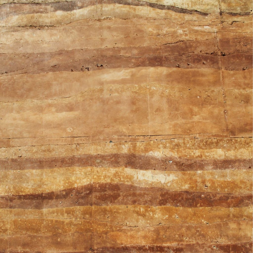 Rammed earth wall. Photo credit: chayotk