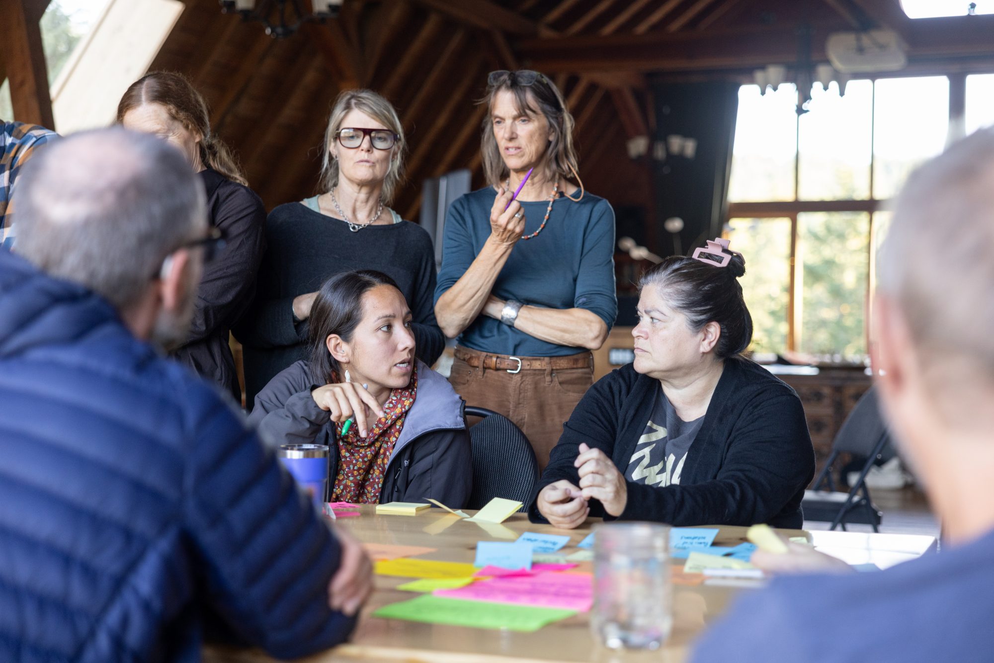 Participants of the Shared Watershed Pathways Dialogue in discussion this past fall.