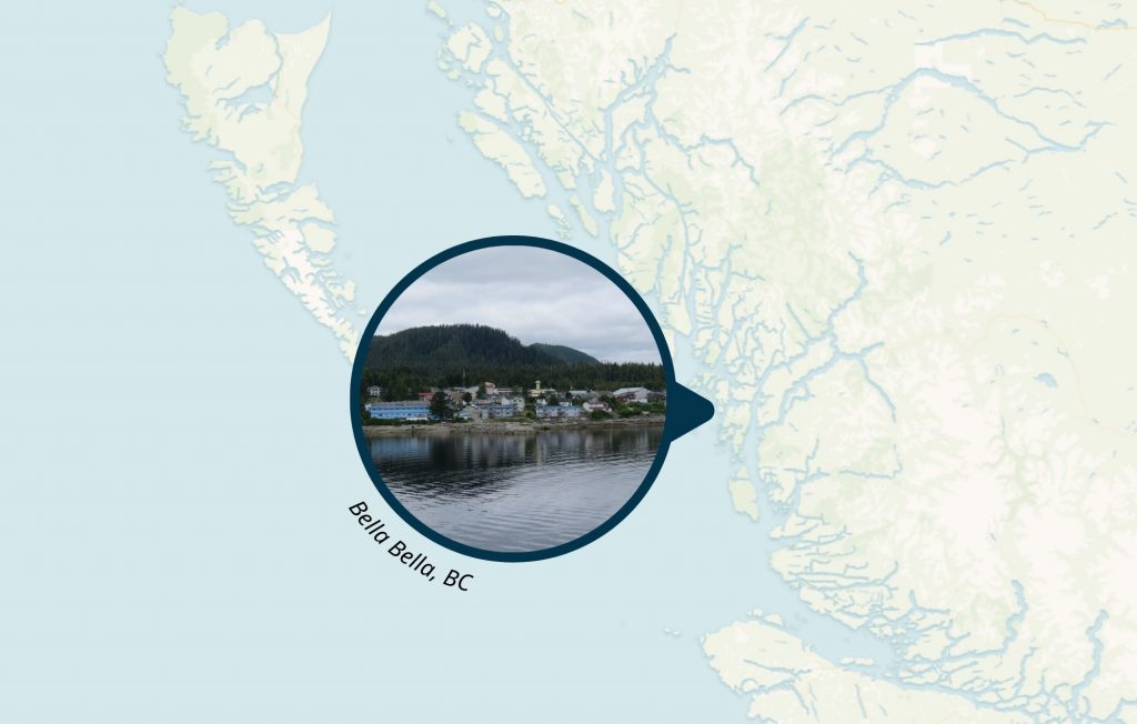 Cover photo for the Bella Bella VCH modular project. Photo of Bella Bella in a circular frame, with a map of the area in the background. Photo credit: The Interior.