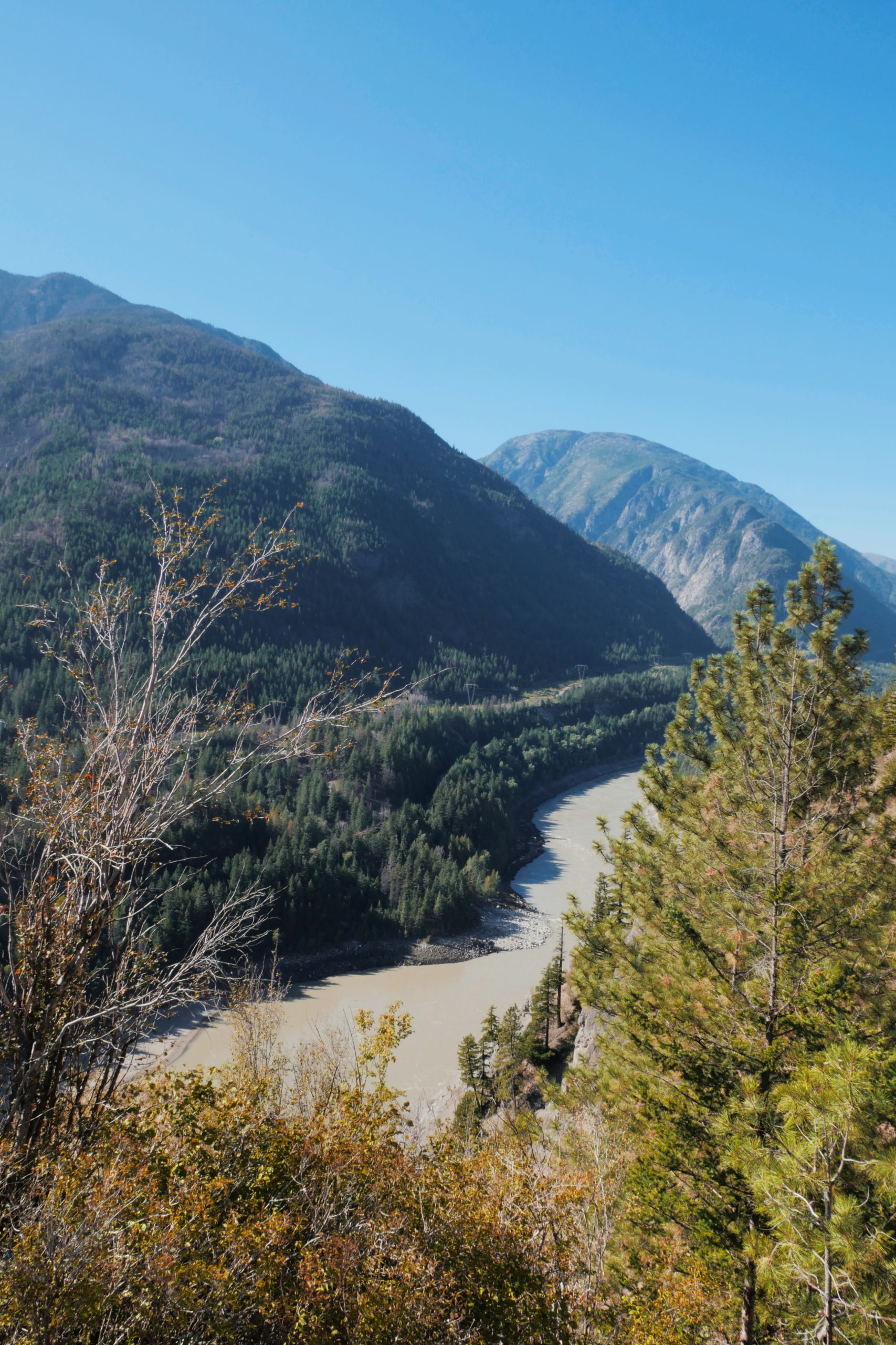 The Fraser River running through the Fraser Canyon during a summer season in the Fraser Valley, British Columbia, Canada.